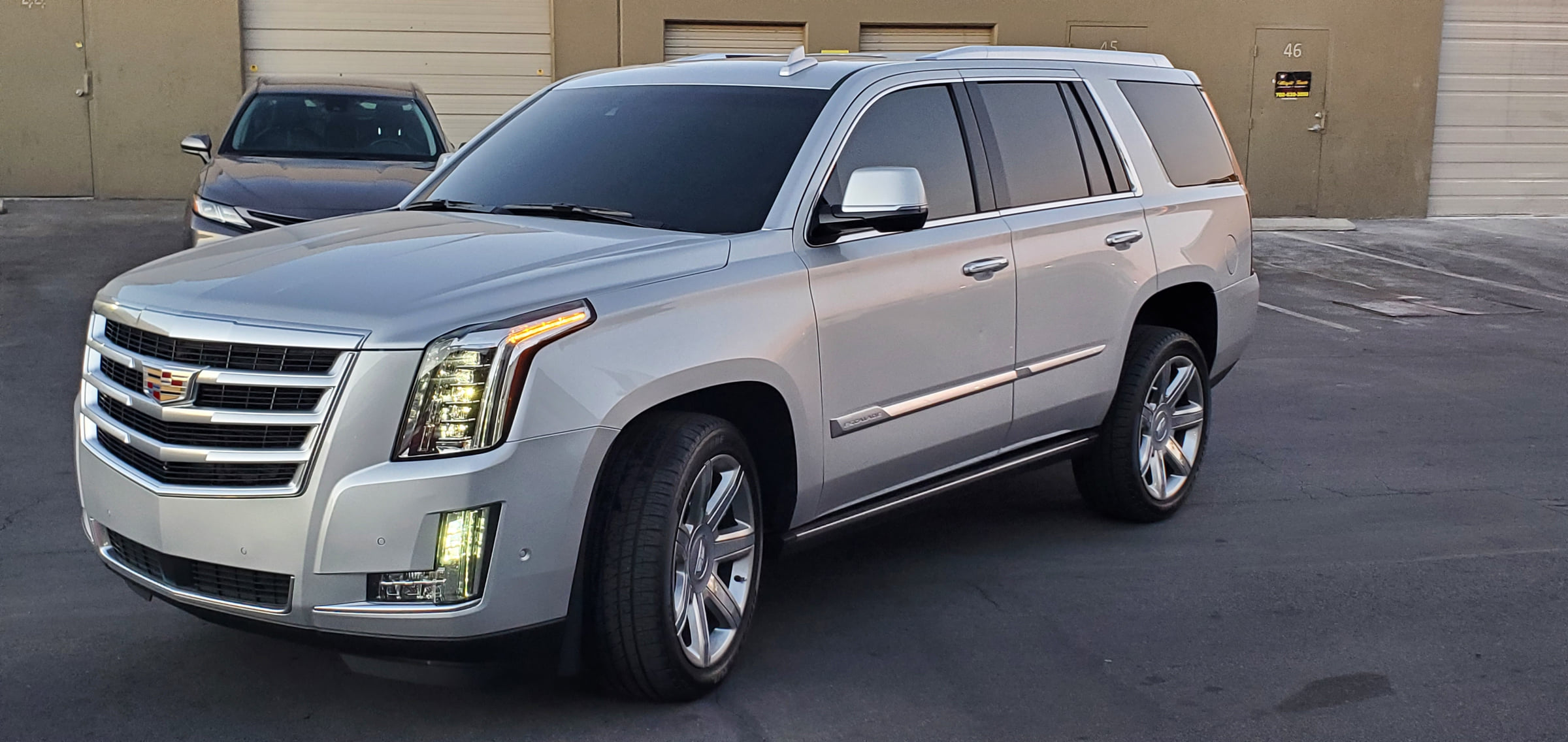 Cadillac Escalade limo with full window tint